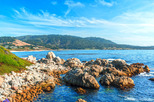 view of Carmel, California with ocean and mountain 