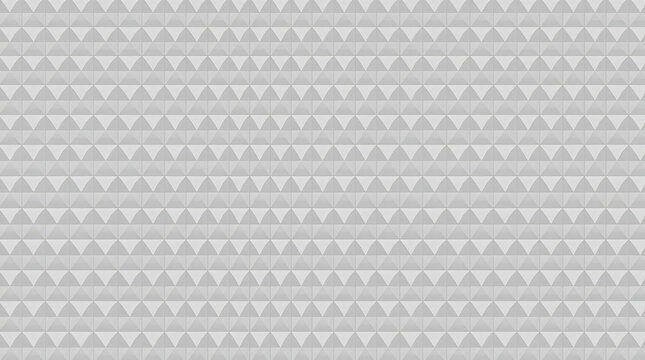 Geometric pattern with embossed pyramid shapes creating a subtle texture background in neutral tones