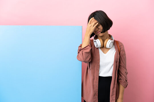 Young student mixed race woman with a big banner over isolated background with headache