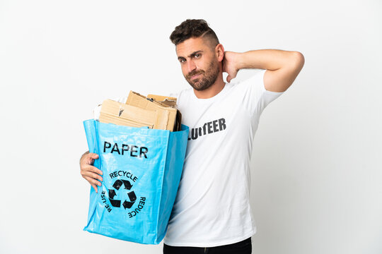 Caucasian man holding a recycling bag full of paper to recycle isolated on white background having doubts