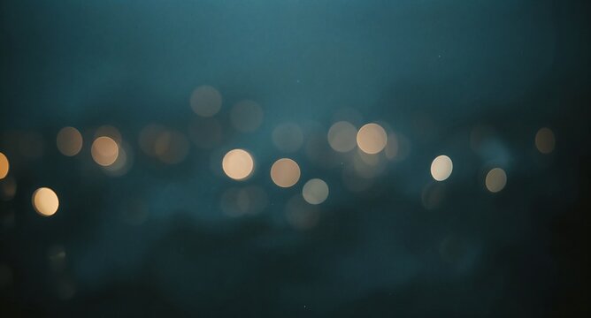 Soft warm bokeh circles scattered across a dark moody twilight background with blurred lights