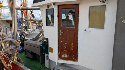 Fishing vessel wheelhouse and working deck in Greetsiel harbor.  © Inha