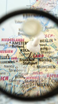 Focus on cities in Germany with a map and pin used to mark locations like Frankfurt and Stuttgart