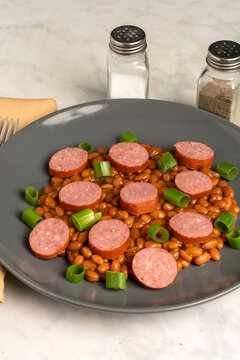 kielbasas with green onions and baked beans