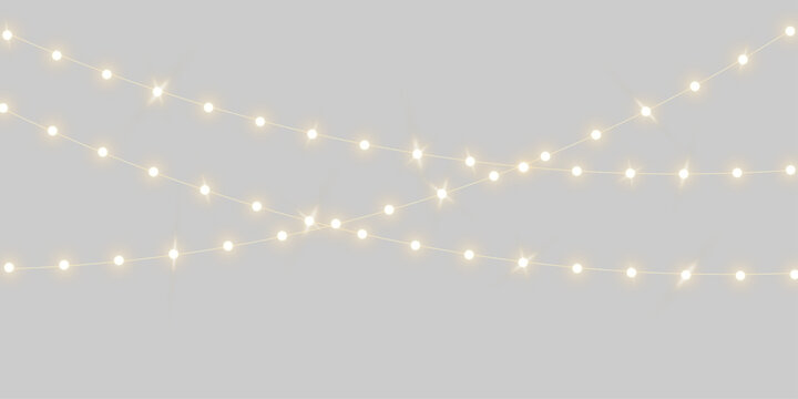 Warm glowing led lighting, string lights garland or Christmas fairy light overlay with shiny glittering white bulbs illumination for festive event outdoor party decoration on transparent background