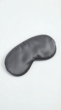Charcoal silk sleep mask with contoured eye cups and elastic band
