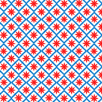 Seamless geometric pattern with red flower motifs and blue zigzag diamond grid