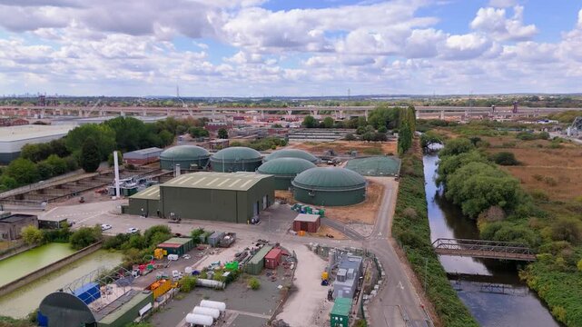 An aerial forward push in view of a waste water treatment plant and the anaerobic digester tanks to provide electricity and heat for the facility