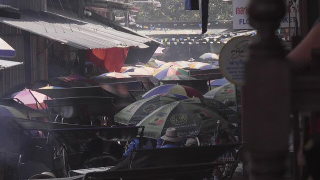Damnoen Saduak Floating Market in Thailand, during a very busy day.
