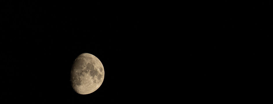 Detailed moon with negative space against a black night sky