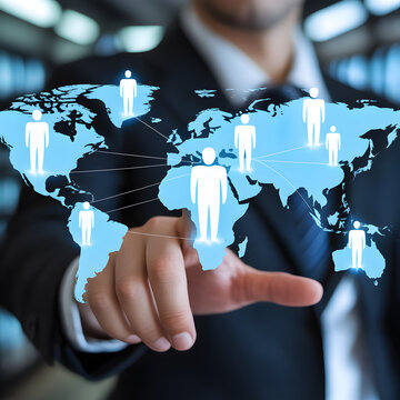 Business executive selecting a glowing location on a digital world map, representing global leadership, international networking, and workforce management
