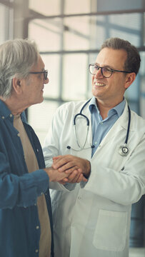 Doctor comforting patient during consultation