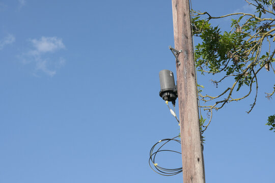 Utility pole with blue sky