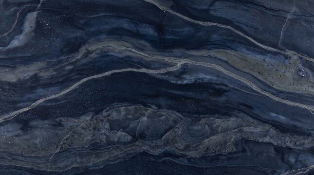 A navy cloud vein marble surface displays swirling patterns and tonal variations in a polished stone texture agate azure background