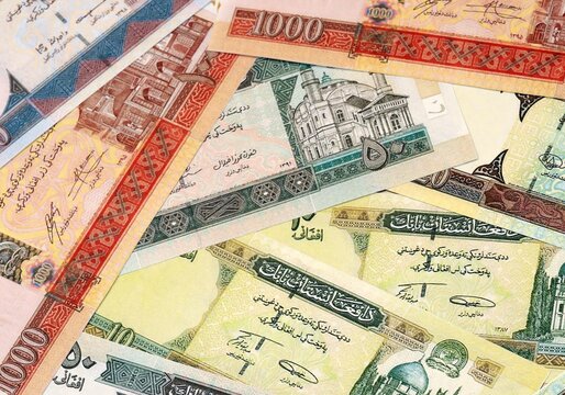 Afghan afghani money bills in pile on table. Afghanistan AFN currency cash close up