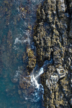 waves crashing on rocks