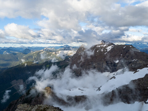 Snowy Mountain Peak and Cloudscape Over Alpine Wilderness Near Chilliwack, British Columbia, Canada