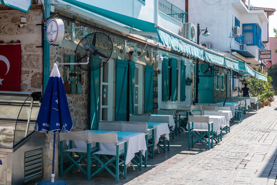 Antalya, Turkey - October 6, 2023. A display of colorful chairs on a terras in Antalya.