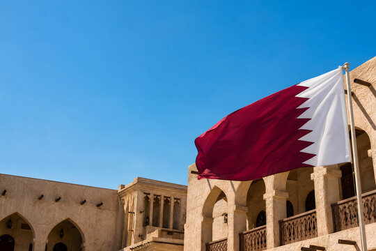 Qatar katara cultural village qatari flag waving heritage architecture
