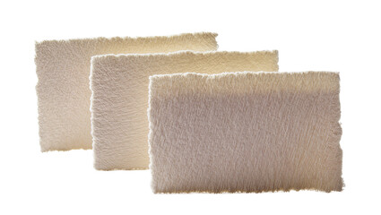 Obraz premium Three textured handmade paper sheets with torn edges, isolated on transparent background