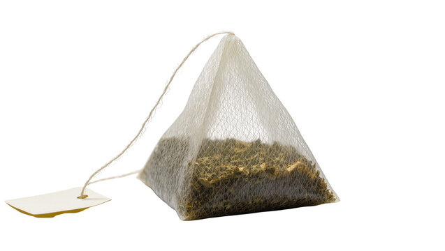 Pyramid tea bag with loose leaf tea and paper tag, isolated on transparent background