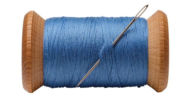 Wooden spool with blue thread and two needles, isolated on transparent background