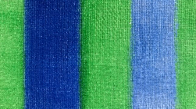 Bold green and blue striped textile surface with visible woven fibers, a vibrant graphic fabric background