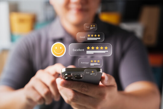 A man uses a smartphone with a glowing virtual hologram displaying an excellent five-star customer satisfaction rating. This smart technology represents positive feedback and great business service.