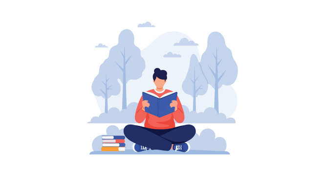 A young person sits cross-legged outdoors reading a book with a stack of books nearby against a scenic tree background.