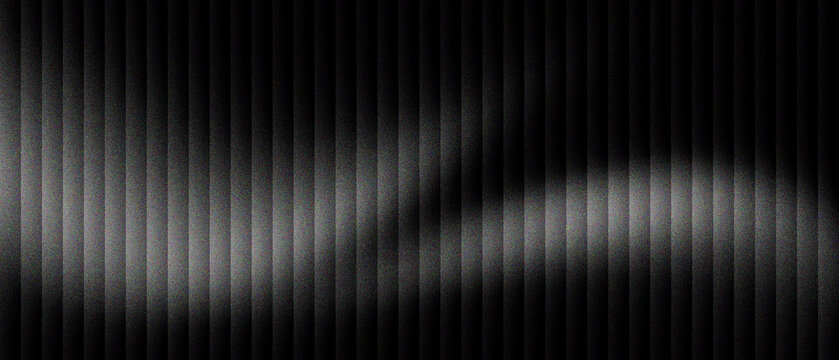 Metallic black corrugated texture with soft light wave. Dark industrial metal panel background. Abstract carbon steel surface with vertical lines. Sleek chrome finish for luxury tech design.