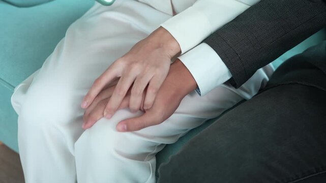Manager or senior sexually harassed a female colleague by touch her leg. Sexual harassment in office. feel anxious and stressed from being harassed. molest, assault, inappropriate, discrimination
