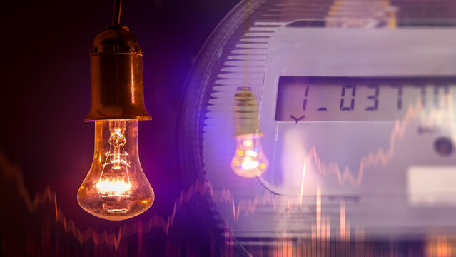 Electricity consumption. Smart meter monitors power use while a glowing light bulb and financial charts represent energy costs, pricing and demand.