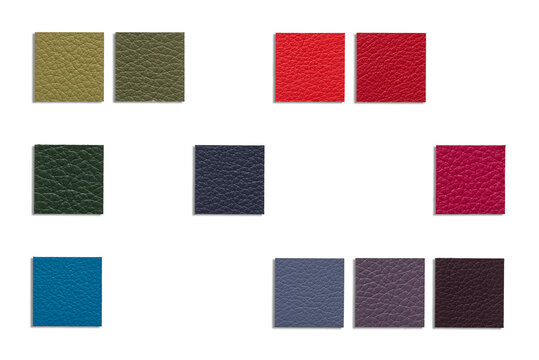 Assortment of vibrant and cool leather sample swatches arranged on white background