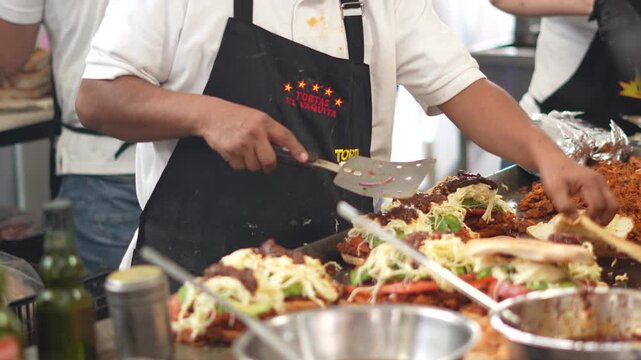 Close Shot Of Chef With His Team Preparing Delicious Mexican Torta, Mexico