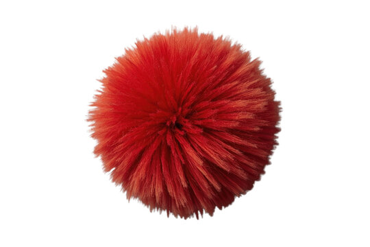 Large fluffy red pompom ball with soft fibers
