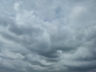 Obraz premium Storm Clouds Overcast Sky with Dramatic Gray Blue Cloudscape and Moody Weather Background