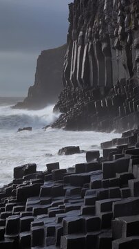 Dramatic Waves Crashing Against Basalt Columns Generative AI