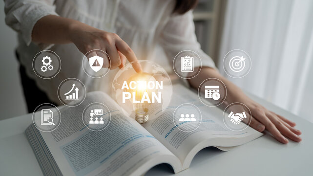 Conceptual image illustrating an action plan with a light bulb effect over an open book, symbolizing strategic thinking and decision-making in a business setting. Ledger