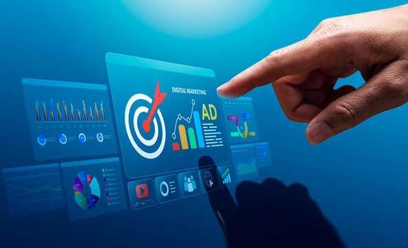 Digital marketing analytics concept with hand touching virtual advertising dashboard showing target campaign data, online ad performance, audience engagement and sales growth strategy