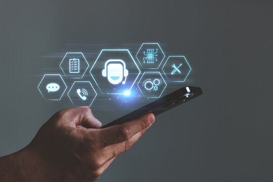 Person hand using a smartphone. Service support customer help call center business technology button on virtual screen. Technical Support Center Customer Service Internet Business Technology Concept.