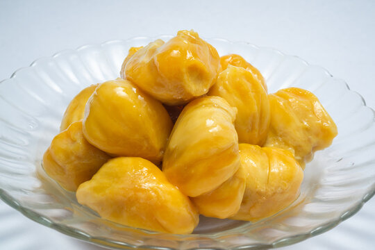 Close up Fresh Ripe Cempedak in Glass Bowl isolated white