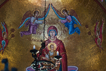 Obraz premium Colorful Byzantine mosaics and frescoes inside a Greek Orthodox church