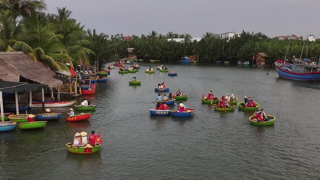 Aerial view of the natural scenery of basket boats on the Thu Bon River in Hoi An Ancient Town, Vietnam