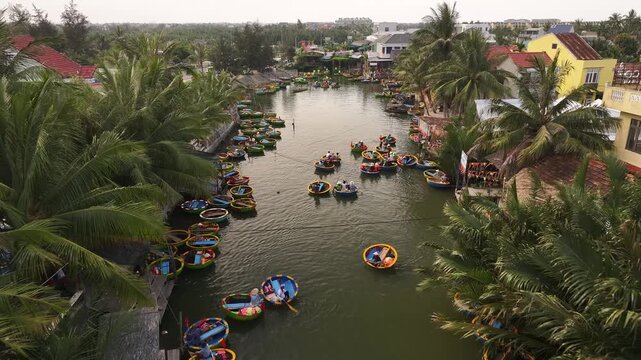Aerial view of the natural scenery of basket boats on the Thu Bon River in Hoi An Ancient Town, Vietnam