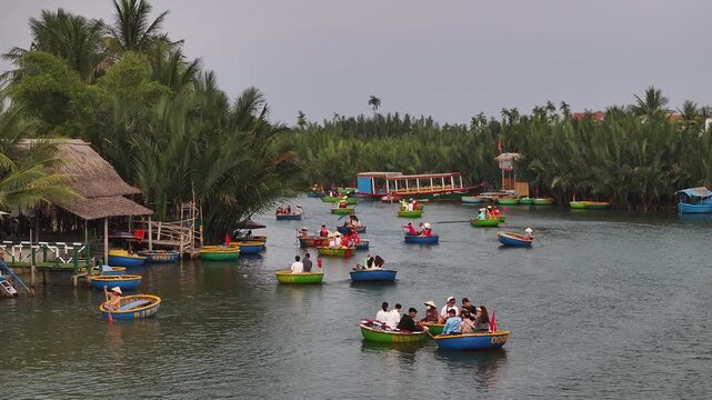 Aerial view of the natural scenery of basket boats on the Thu Bon River in Hoi An Ancient Town, Vietnam