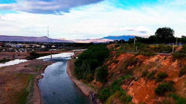 Flyover of the Colorado River during late summer in a bad draught season, located near Las Colonias Park in Grand Junction, Colorado.