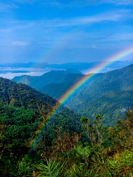 Rainbow in the morning at Lerkwador Mountain or Mountain of Faith, Tak province, Thailand