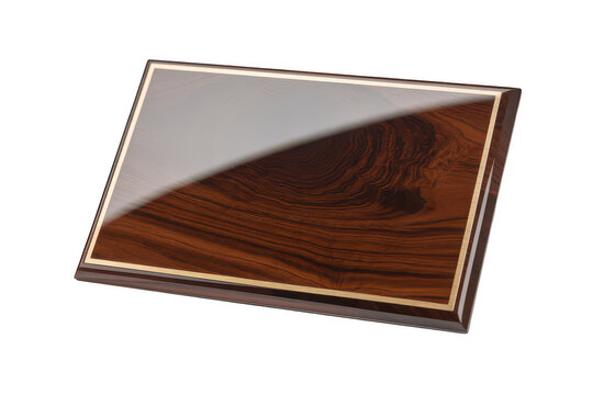A rectangular wooden plaque with a glossy polished finish and a thin gold border isolated on a black background, for awards or signage