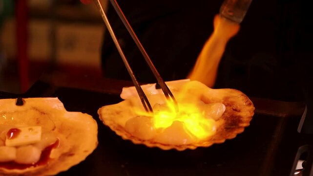 Japanese Street Food Chef Grilling Scallops with Blowtorch in Tokyo