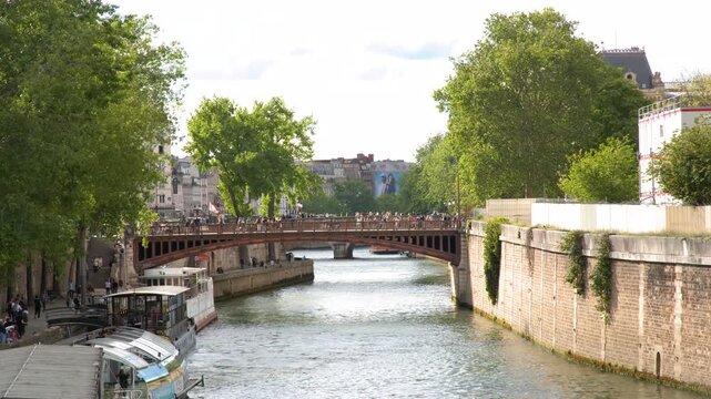 Pont au Double Bridge and Seine River in Paris France